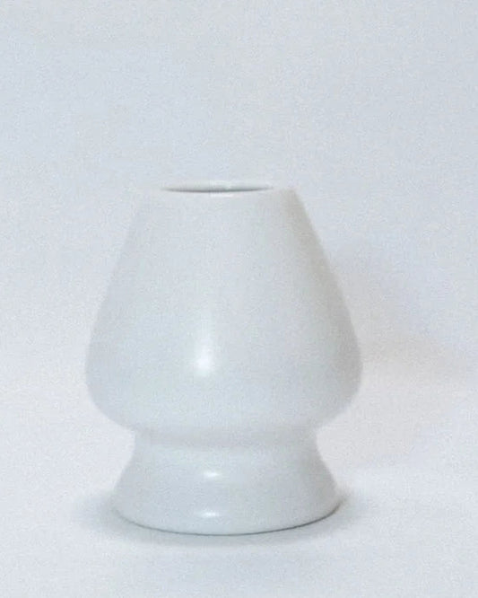 White ceramic whisk stand